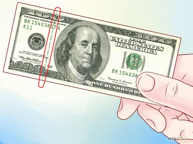 US Money embedded anti-counterfeiting strip